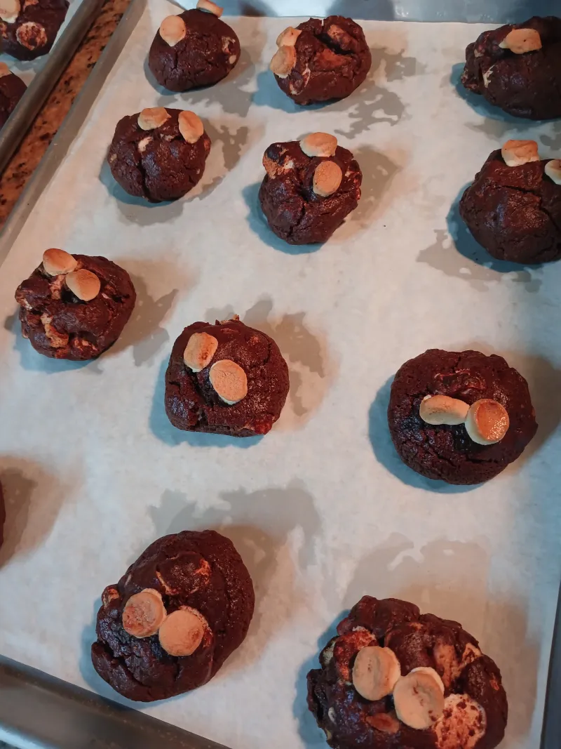Triple Chocolate S'mores Cookies on a baking pan