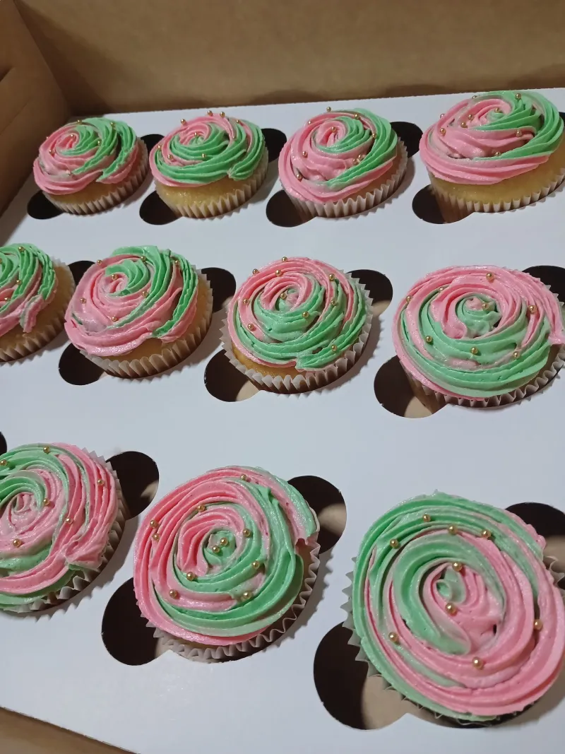 Sponge cupcakes with green and pink buttercream